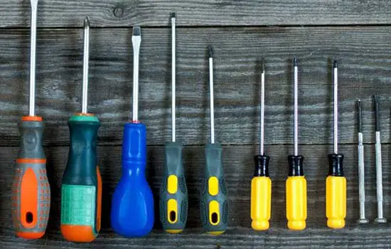 Using a plastic-handled screwdriver can cause sparks