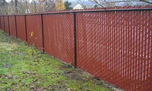 Steps to Cover a Chain Link Fence with Wood